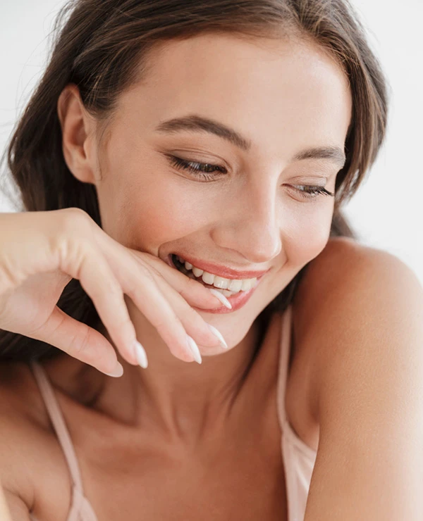 Woman smiling with clear skin